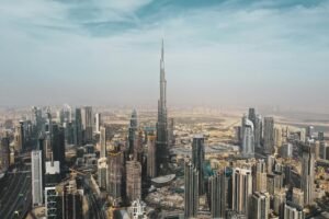 Panoramic view of Dubai skyline showcasing top real estate investment areas in 2025
