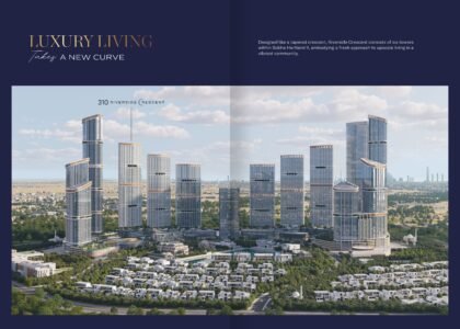 Aerial view of 310 Riverside Crescent tower in Sobha Hartland II with lagoon and skyline backdrop