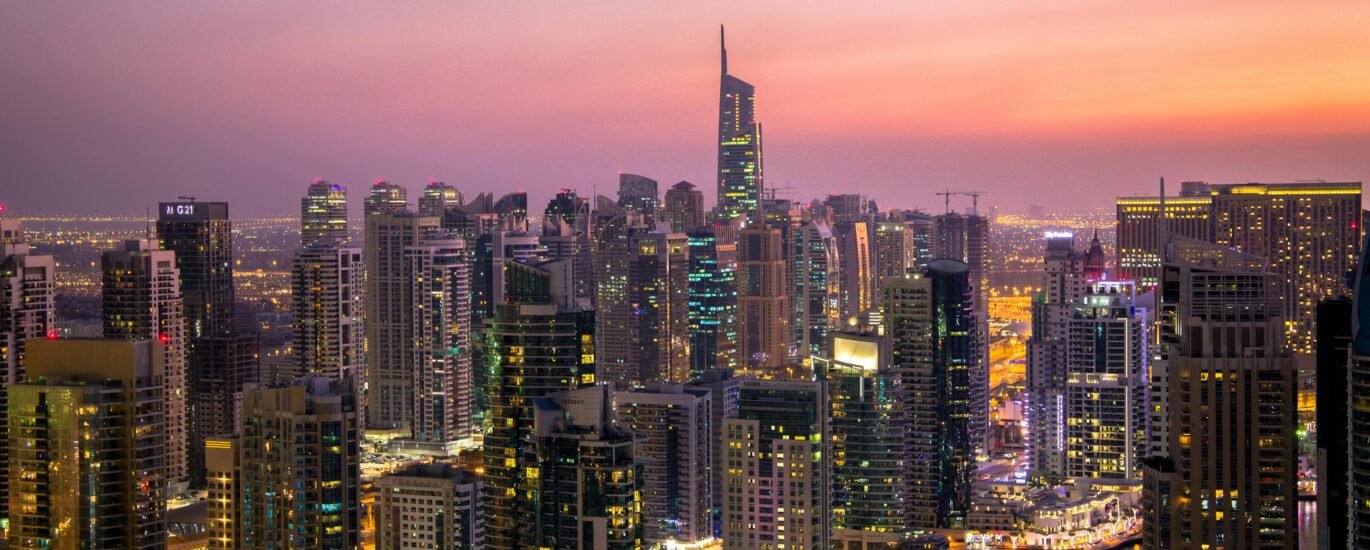 Skyline of Dubai with foreign investors exploring real estate opportunities amid currency changes