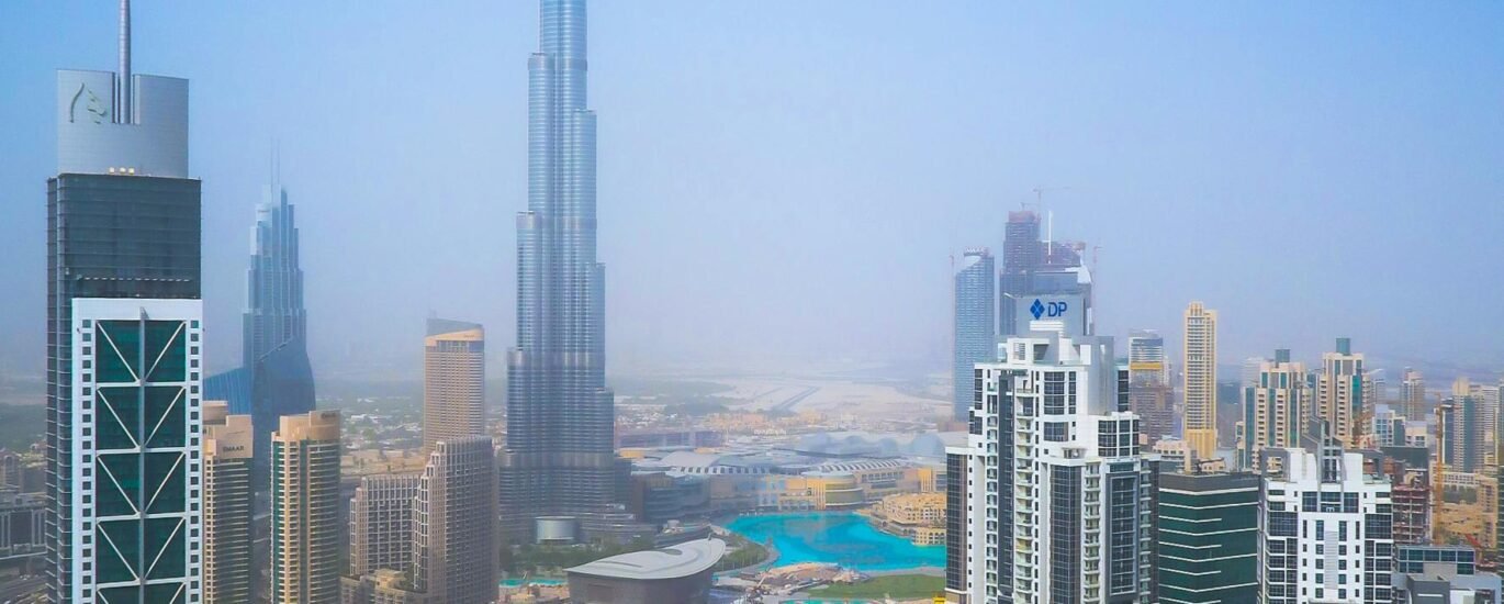 Luxury apartment buildings in Downtown Dubai skyline with high-value property deals