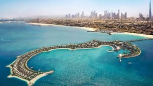 Luxury waterfront properties in Jumeira Bay, Dubai with aerial view of upscale homes