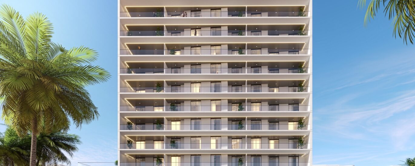 Alma Gardens residential building in Dubailand Liwan surrounded by green parkland