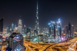 Dubai skyline showing luxury high-rises and waterfront developments at sunset