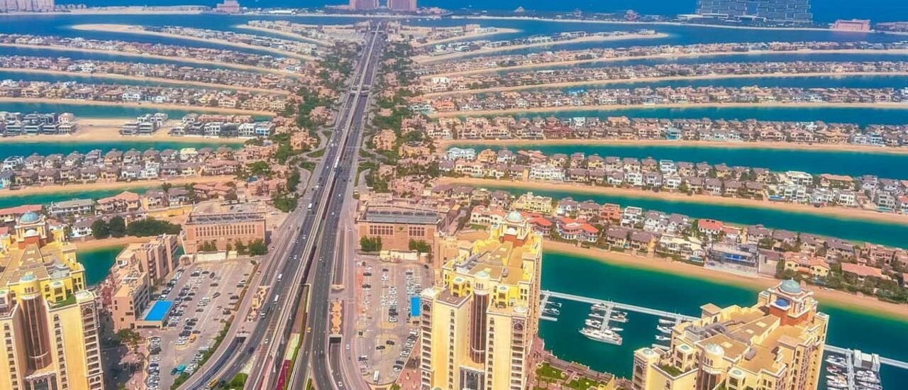 Aerial view of Palm Jumeirah island in Dubai showing luxury waterfront land