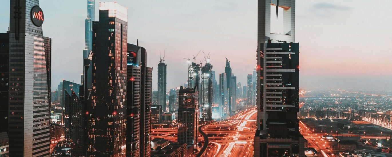 High-rise office buildings in Business Bay, Dubai skyline during sunset